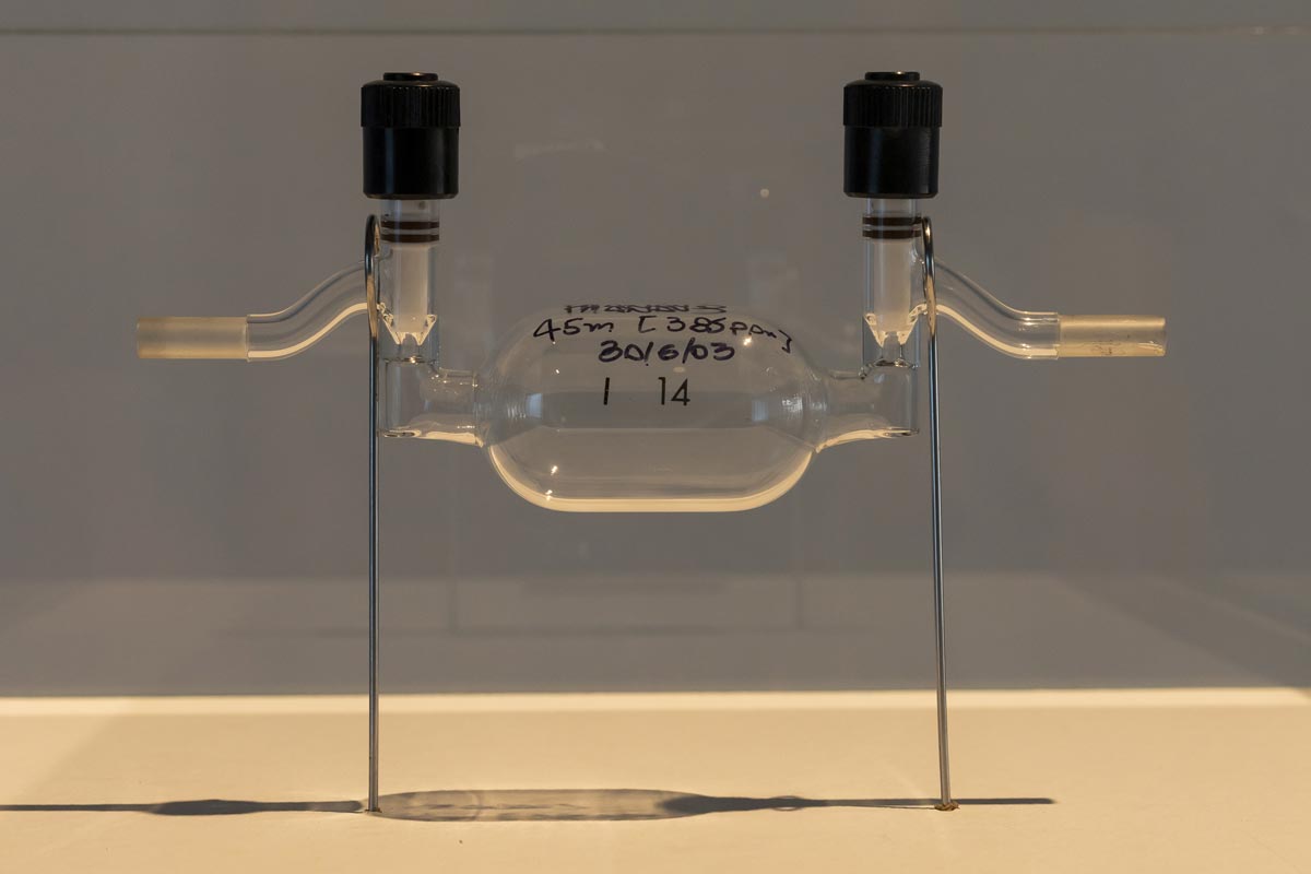 A glass tubes and container filled with air.